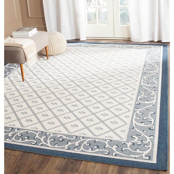 Courtyard Beige/Navy 9 ft. x 12 ft. Border Indoor/Outdoor Patio  Area Rug