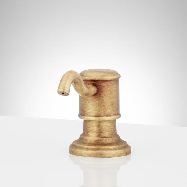 Amberly Sink Mount Soap Dispenser in Aged Brass