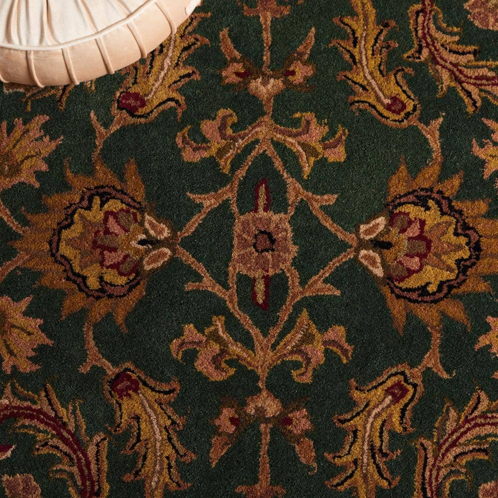 Handmade Oval Tufted Red Wool Rug 4' x 6'
