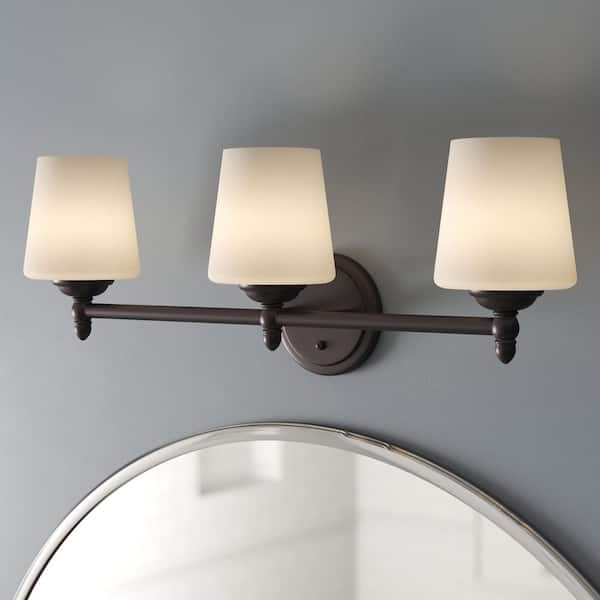 Designers Fountain Darcy 25 in. 3-Light Oil Rubbed Bronze Transitional Vanity Light with White Opal Glass Shades