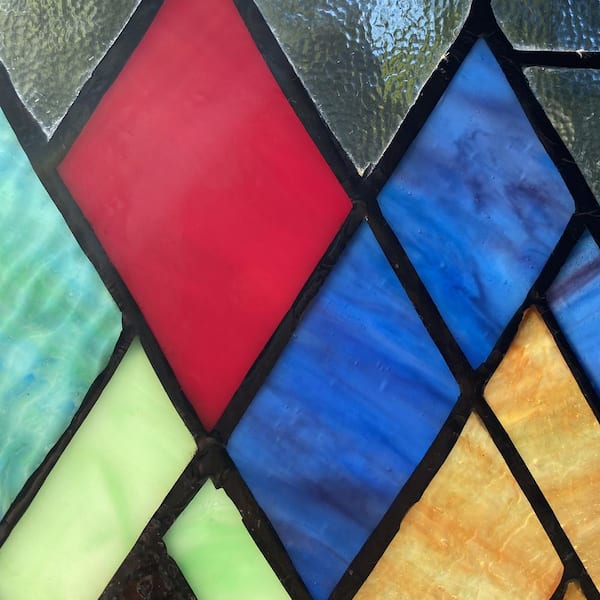 https://images.thdstatic.com/productImages/f2a9a942-f540-5736-ac03-299122352b99/svn/amber-river-of-goods-stained-glass-panels-20555-77_600.jpg