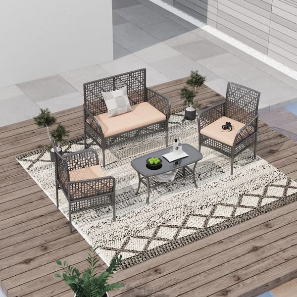Zeus & Ruta 4-Piece Wicker Patio Conversation Set with Beige Cushions and Coffee Table for Backyard