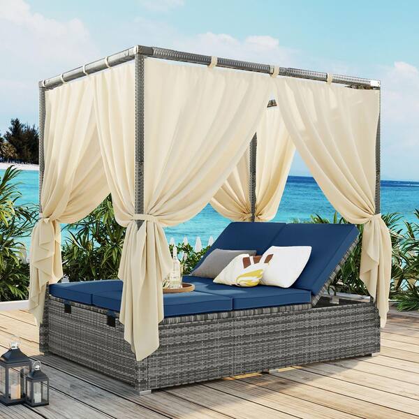 Boosicavelly Gray Wicker Outdoor Day Bed with Blue Cushions and Beige Curtains and Adjustable Backrest
