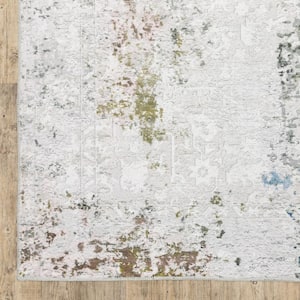 4' X 6' Ivory And Blue Abstract Printed Stain Resistant Non Skid Area Rug