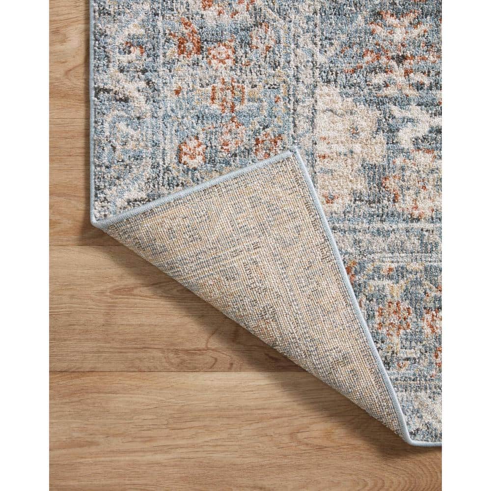 Odette Sky and Rust Synthetic Stain-Resistant Area Rug 5'-3" x 7'-9"