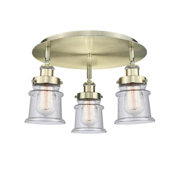 Canton 17 in. 3-Light Antique Brass Industrial Flush Mount with Seeded Glass Shade