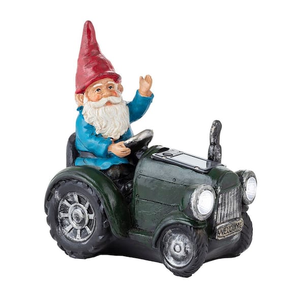 Alpine Corporation 10 in. Tall Outdoor Garden Gnome Riding Green Tractor Yard Statue Decoration with LED Lights, Multicolor