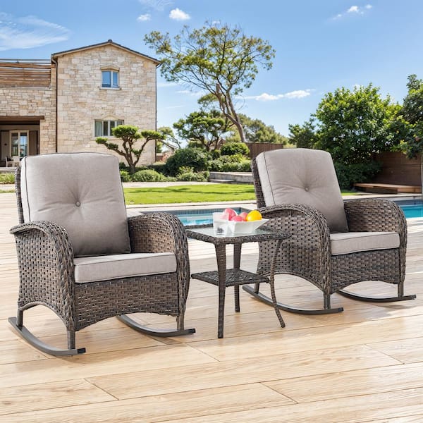Brown 3-Piece Wicker Outdoor Rocking Chair with Beige Cushions and Side Table