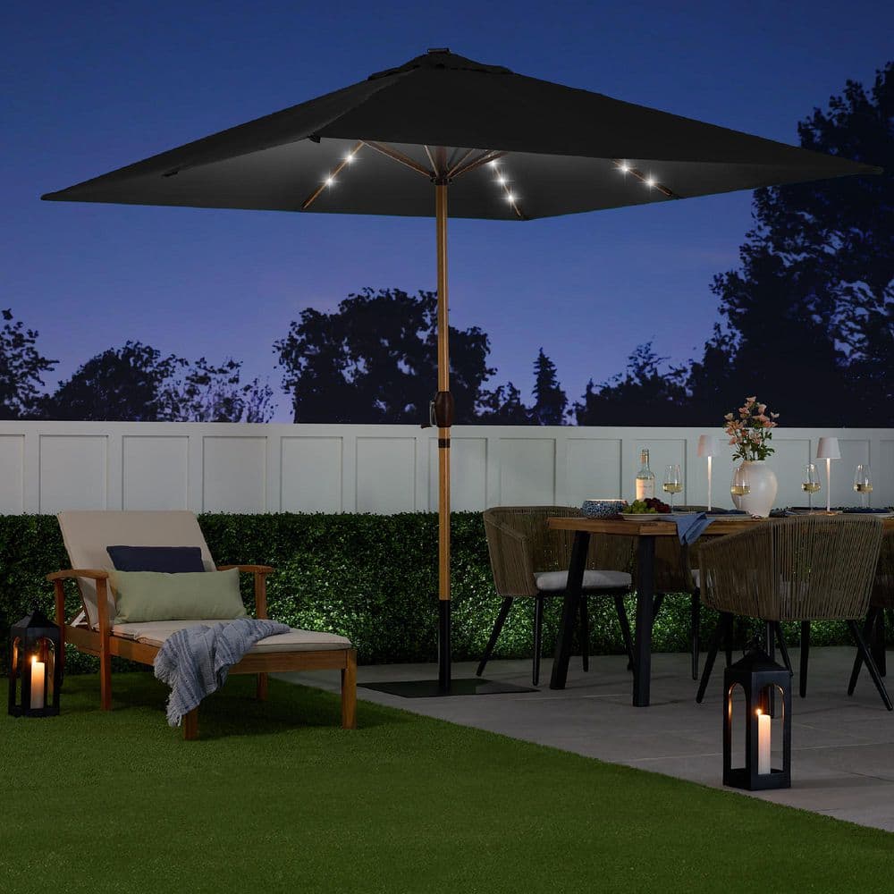 9ft Black Solar LED Lighted Market Patio Umbrella with Faux Wood Texture
