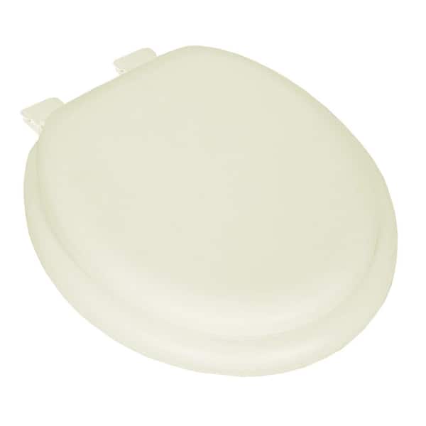 JONES STEPHENS Deluxe Soft Seat with Wood Cores Round Closed Front Toilet Seat with Cover and Adjustable QuicKlean Hinge in Bone