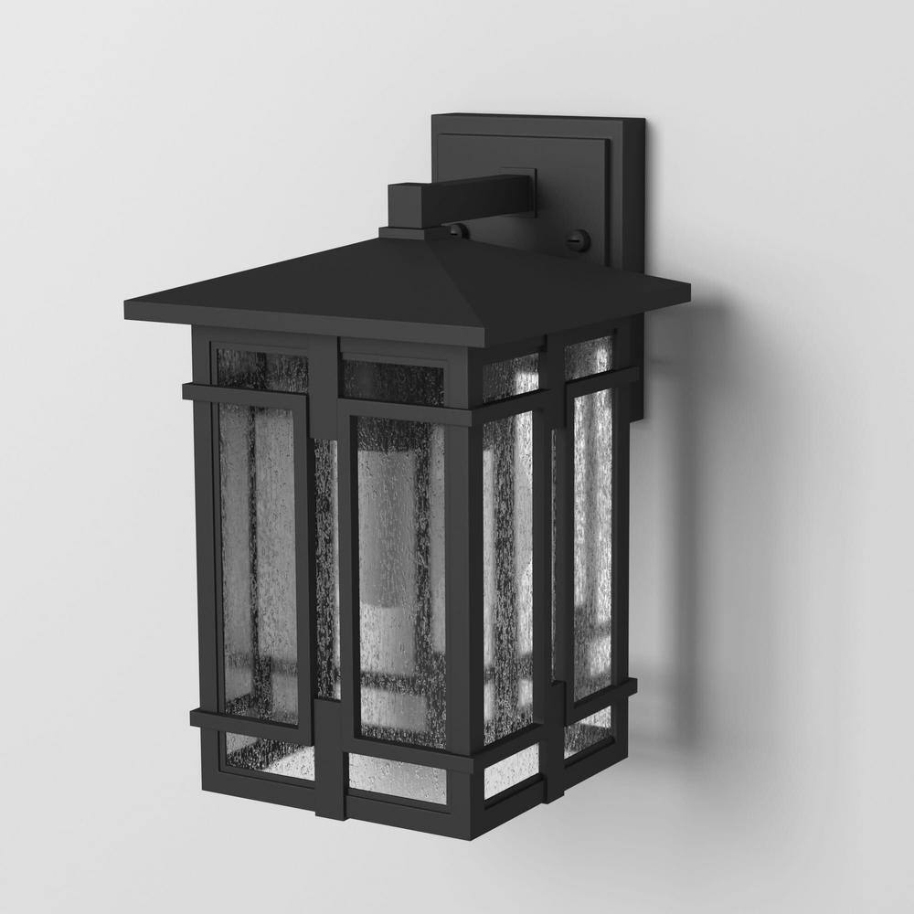 Tucker Museum Black Dimmable Outdoor Wall Sconce with Clear Seedy Glass
