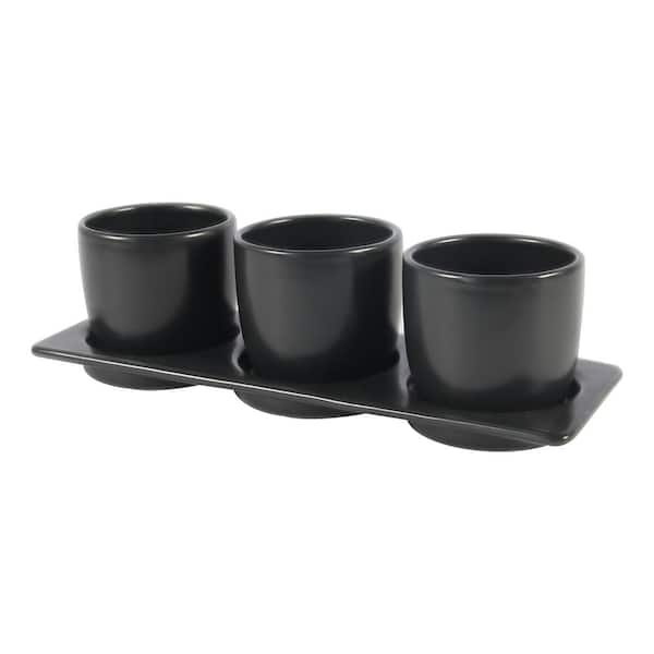 https://images.thdstatic.com/productImages/f323f2d3-efdb-4524-83a2-28f957b369a4/svn/black-made-4-home-plant-pots-320-0003-010-4f_600.jpg