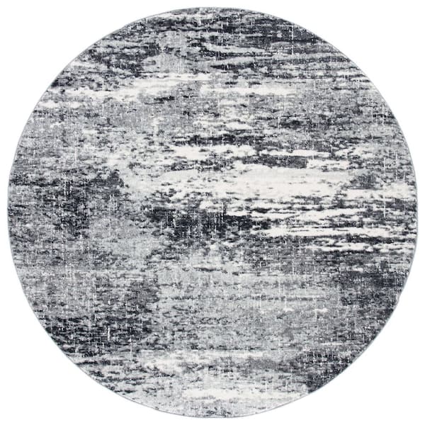 SAFAVIEH Evoke Ivory/Dark Gray 7 ft. x 7 ft. Solid Round Area Rug
