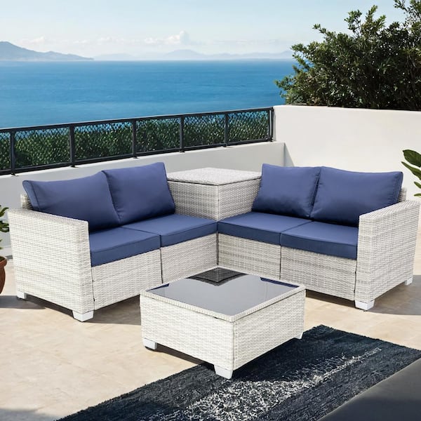 Unbranded 4-Piece Gray Wicker Outdoor Sectional Set with Dark Blue Cushions and Storage Box