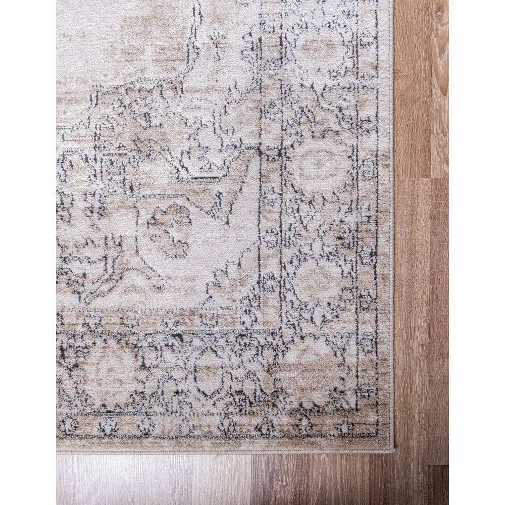 Ivory and Gray Geometric Synthetic 6' x 9' Area Rug
