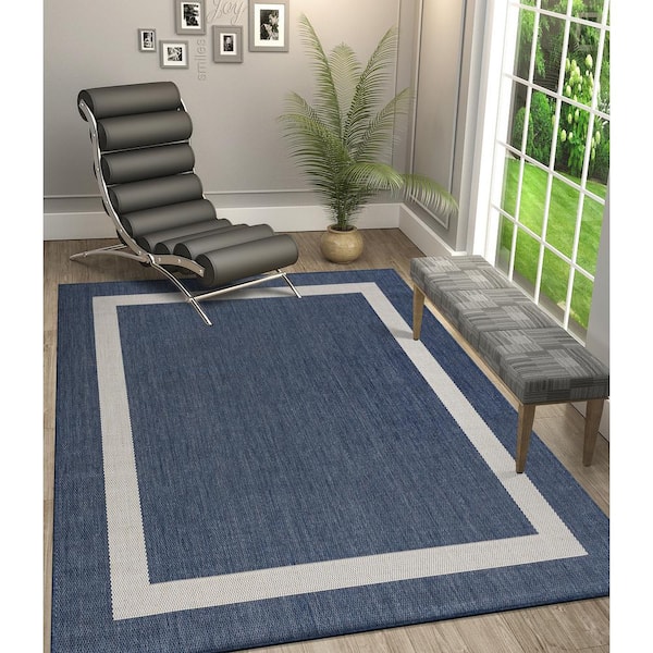 https://images.thdstatic.com/productImages/f34d909f-4398-4a60-abb0-726a2f69f1c4/svn/blue-white-camilson-outdoor-rugs-out403-5x7-hd-31_600.jpg