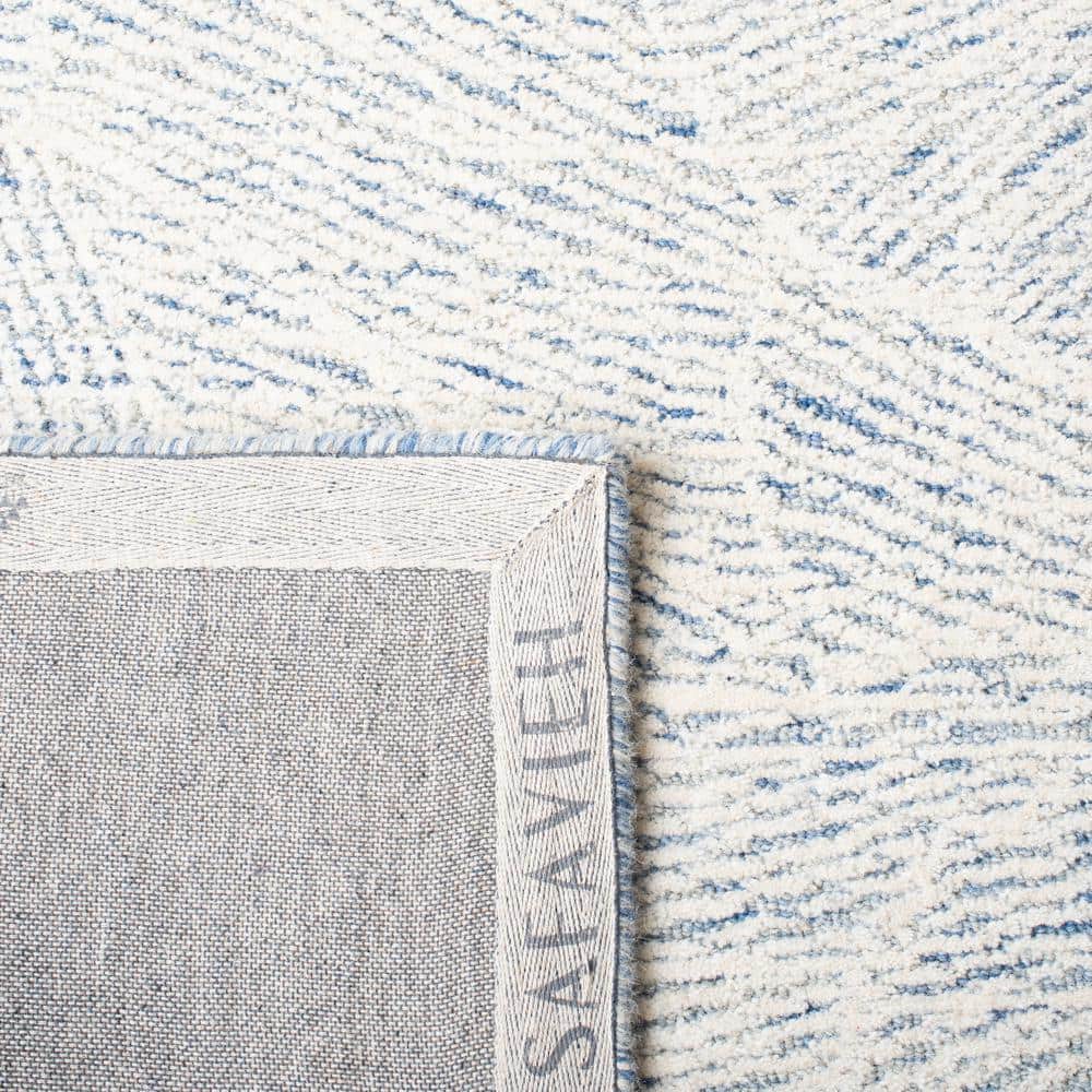 Blue and Ivory Floral Hand-Tufted Wool Area Rug, 5' x 8'