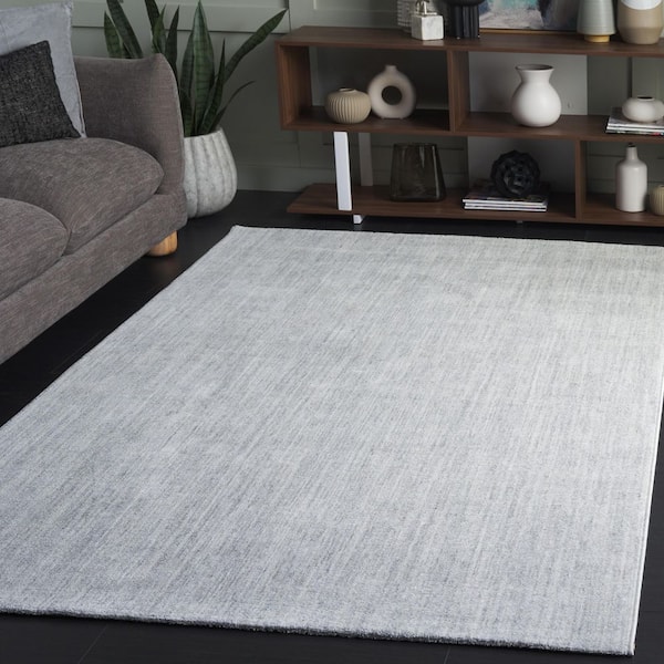 Mabel 9 ft. x 12 ft. Light Blue/Ivory Solid Color Distressed Area Rug