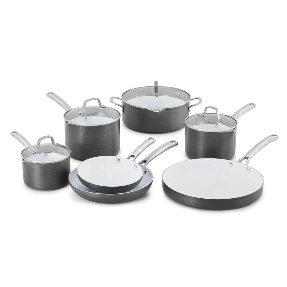 https://images.thdstatic.com/productImages/f37bf4a2-a918-4358-938a-1c016ced906e/svn/black-and-white-calphalon-pot-pan-sets-1937306-64_1000.jpg