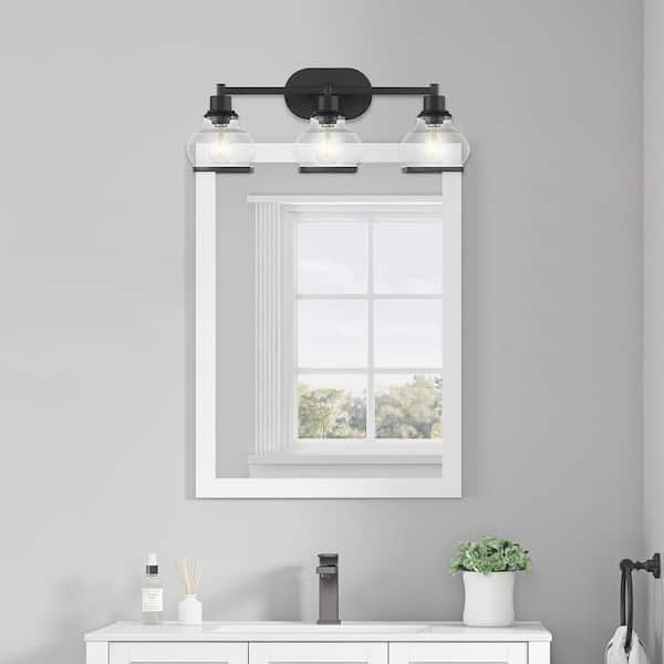 https://images.thdstatic.com/productImages/f37f47a6-ac0d-4922-a55e-2919118feef6/svn/black-ove-decors-vanity-lighting-15lva-the824-p-e1_600.jpg