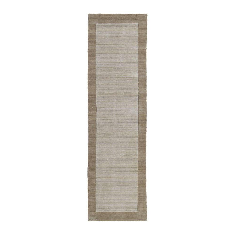Kaleen Regency Ivory 3 ft. x 9 ft. Runner Rug Select the Kaleen 3 ft. x 9 ft. Runner to enhance your home decor. This runner is perfect to use in your hallway or as an accent at the foot of your bed. Designed with ivory features, this runner will add a light and refreshing element to any room. It has a 100% wool design, which insulates heat and can keep your feet warm in the winter months. With materials known to have low VOC emissions, it will be an eco-friendly option for your living area.