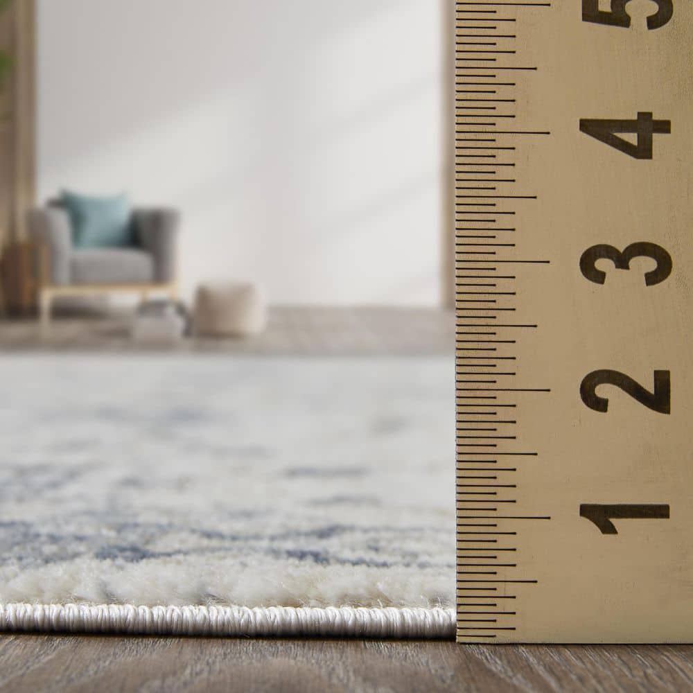 Kehleigh Aylesh 9' x 12' Blue and Cream Synthetic Area Rug