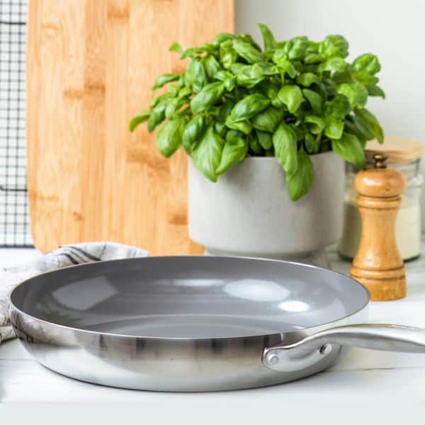 https://images.thdstatic.com/productImages/f3924e12-2cab-4774-95ff-0887e4f78c15/svn/stainless-steel-greenpan-skillets-cc007023-001-c3_600.jpg