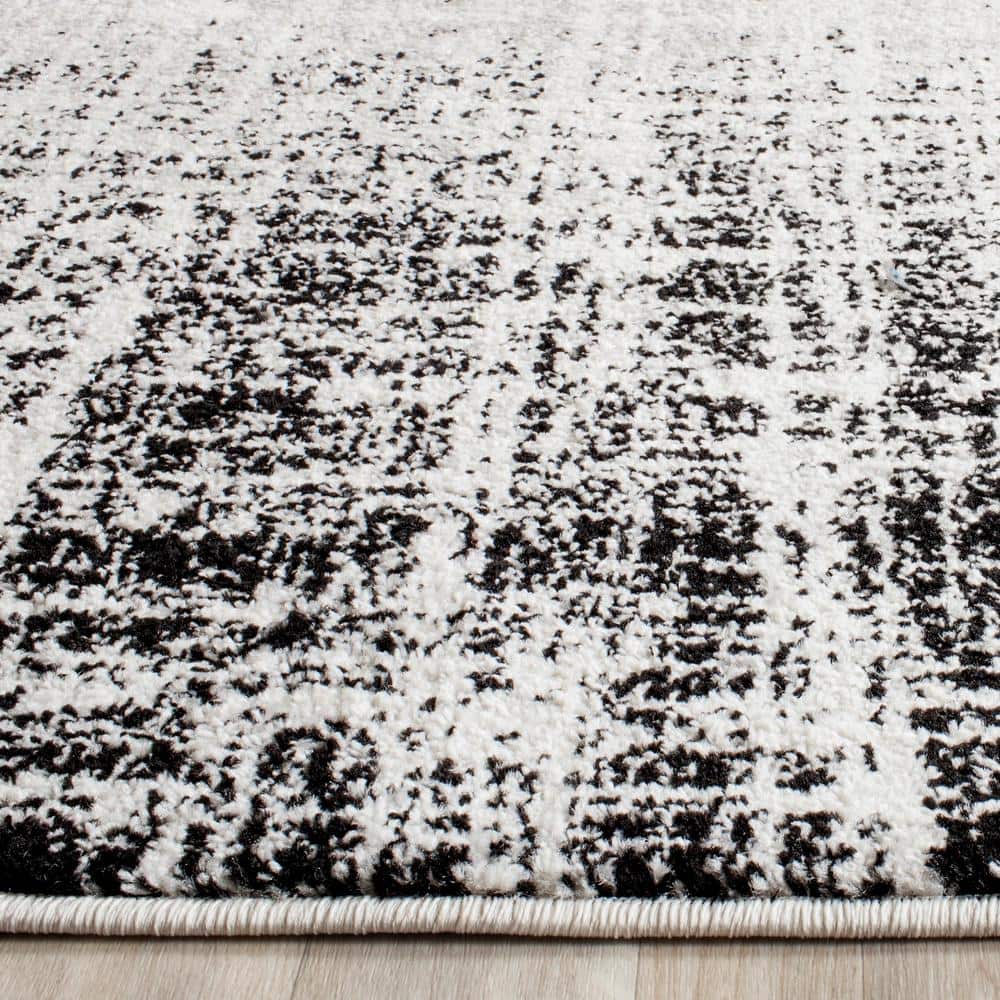Chic Silver and Black Synthetic 30" Easy-Care Runner Rug