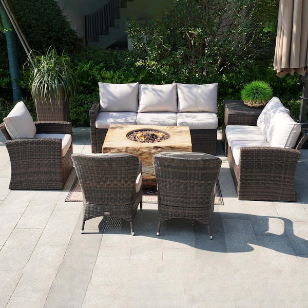moda furnishings 7-Piece Rock and Fiberglass Fire Pit Table Wicker Patio Conversation Set with Beige Cushions and Storage Box