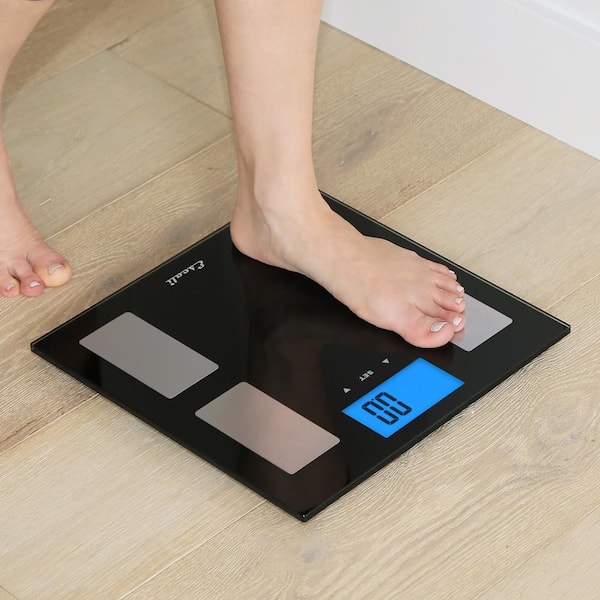 https://images.thdstatic.com/productImages/f3cc500f-c7b9-4614-89ee-1a5dcbe23432/svn/black-with-silver-escali-bathroom-scales-ushm180g-1f_600.jpg