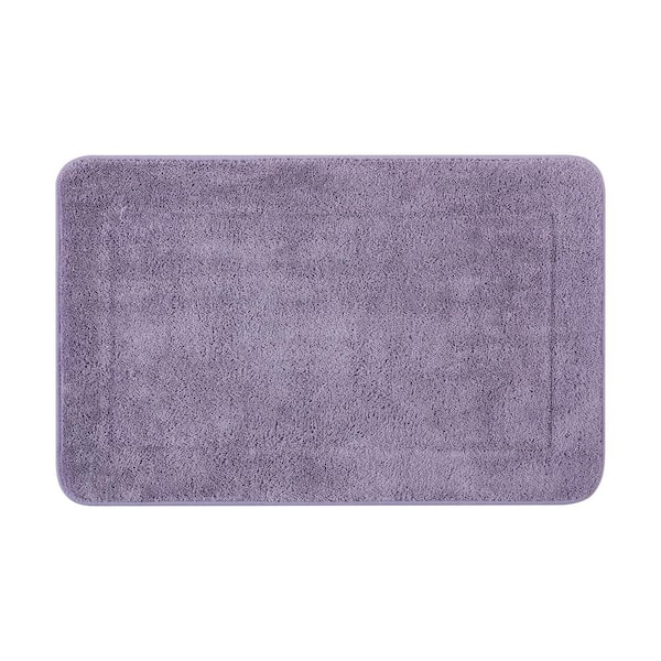 https://images.thdstatic.com/productImages/f40b3bb0-9009-4504-8a08-7d6186927d7b/svn/wisteria-purple-bathroom-rugs-bath-mats-ymb011733-64_600.jpg