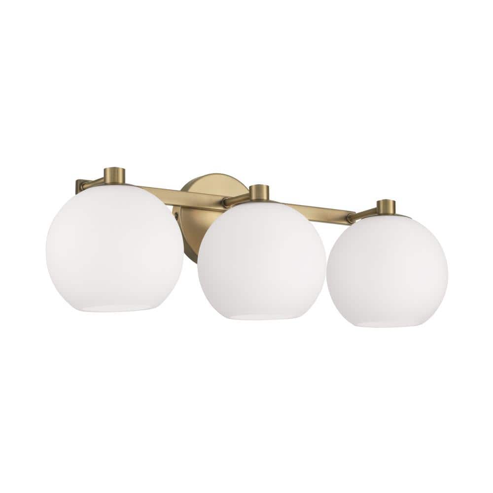22.75 in. W x 8 in. H 3-Light Circular Globe Vanity Light in Aged Brass with Soft White Glass price history on PriceWatchPro