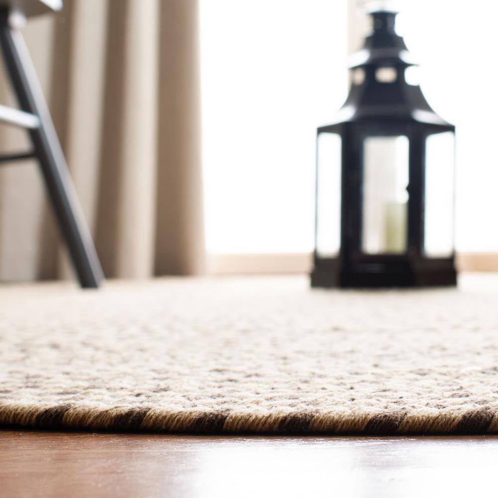 Handmade Beige and Brown Oval Braided Cotton Rug 4' x 6'