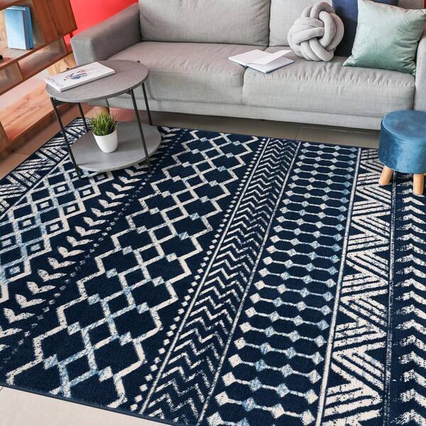 https://images.thdstatic.com/productImages/f431abc6-a63d-423d-a282-aabb013f451b/svn/navy-blue-cream-camilson-area-rugs-cry1001-nvy-8x10-hd-1f_600.jpg