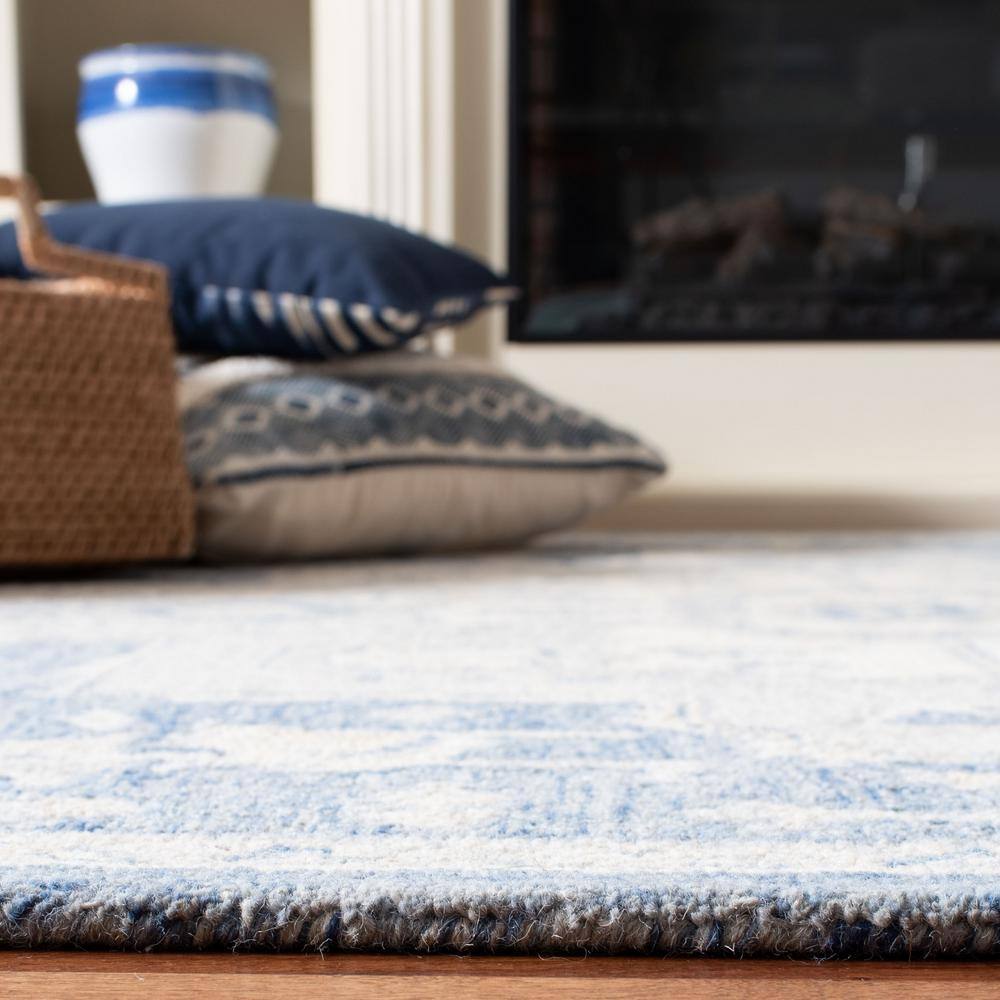 Ivory and Blue Handmade Wool Medallion Area Rug