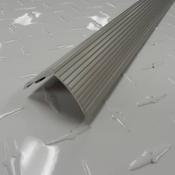https://images.thdstatic.com/productImages/f467ddf3-ee63-413f-a01b-bd003e1c4110/svn/silver-m-d-building-products-tile-transition-strips-43309-1f_600.jpg