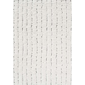 Masai 5 ft. 3 in. X 7 ft. 7 in. Ivory Geometric Indoor Area Rug