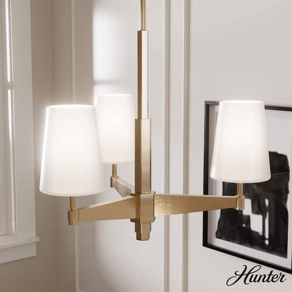 Hunter Nolita 4-Light Alturas Gold Branch Chandelier with Cased White Glass Shades