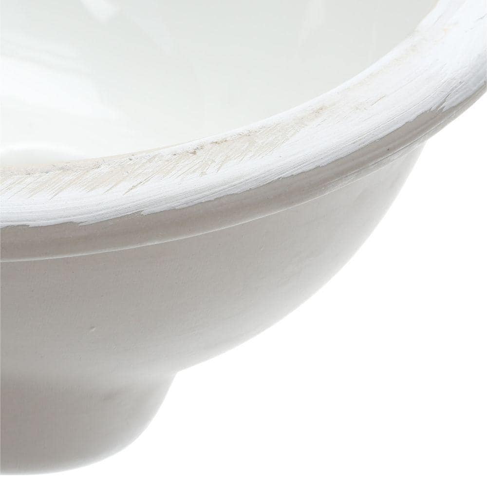 https://images.thdstatic.com/productImages/f487a76e-a2c8-4219-b8d7-81c926d1941e/svn/white-american-standard-undermount-bathroom-sinks-0495-221-020-77_1000.jpg