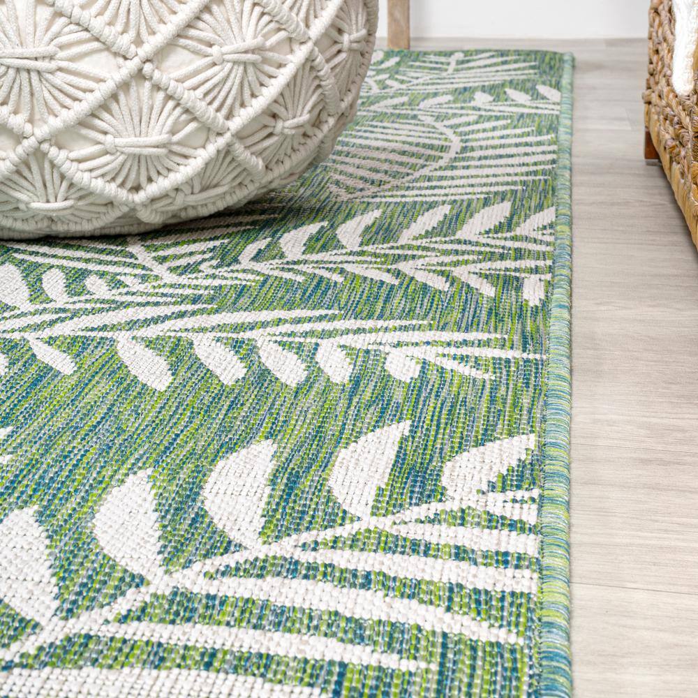 4' x 6' Green and Cream Synthetic Palm Frond Area Rug