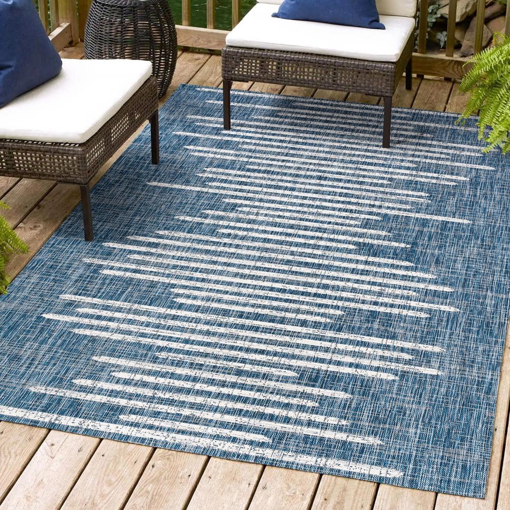 Bohemian Stripe Blue and Ivory Synthetic Area Rug 5' x 8'