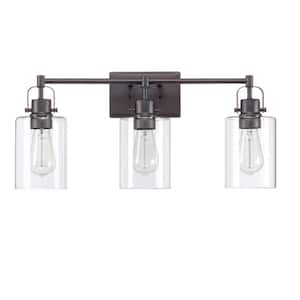 Mhate 23.64 in. 3 Light Dark Bronze Finish Vanity Light with Clear Glass Shade