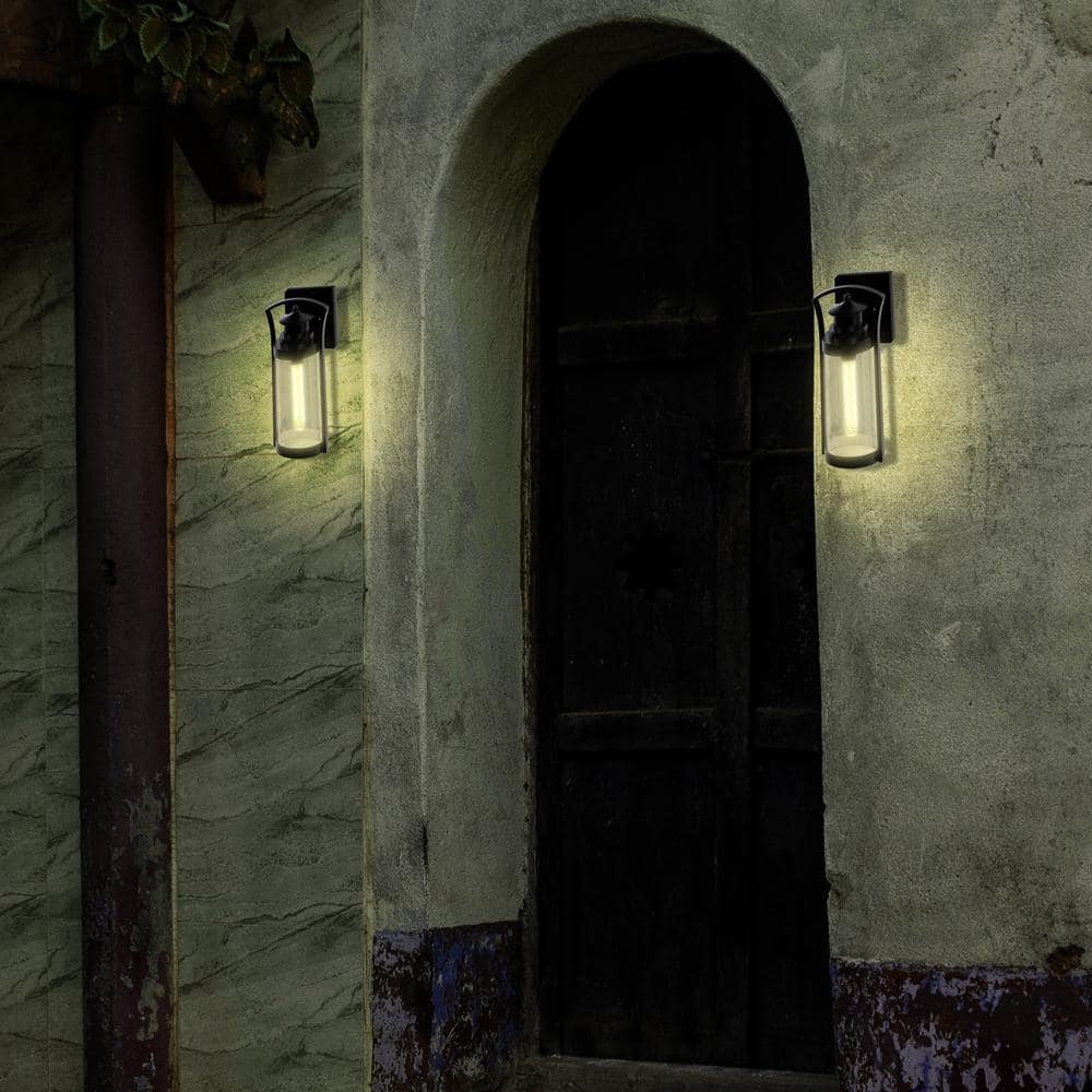 Medium Black Steel Cylinder Outdoor Wall Sconce with Clear Glass Shade