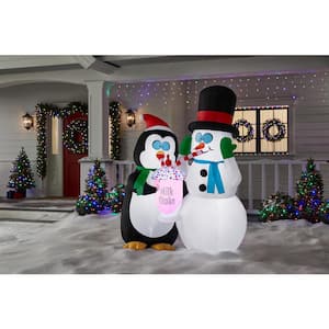 6 ft. Animated LED Snowman and Penguin Drinking Milkshake Christmas Airblown® Inflatable Scene