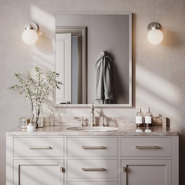Silverdale Collection 1-Light Brushed Nickel Soft Modern Wall Sconce for Bathrooms and Powder Rooms