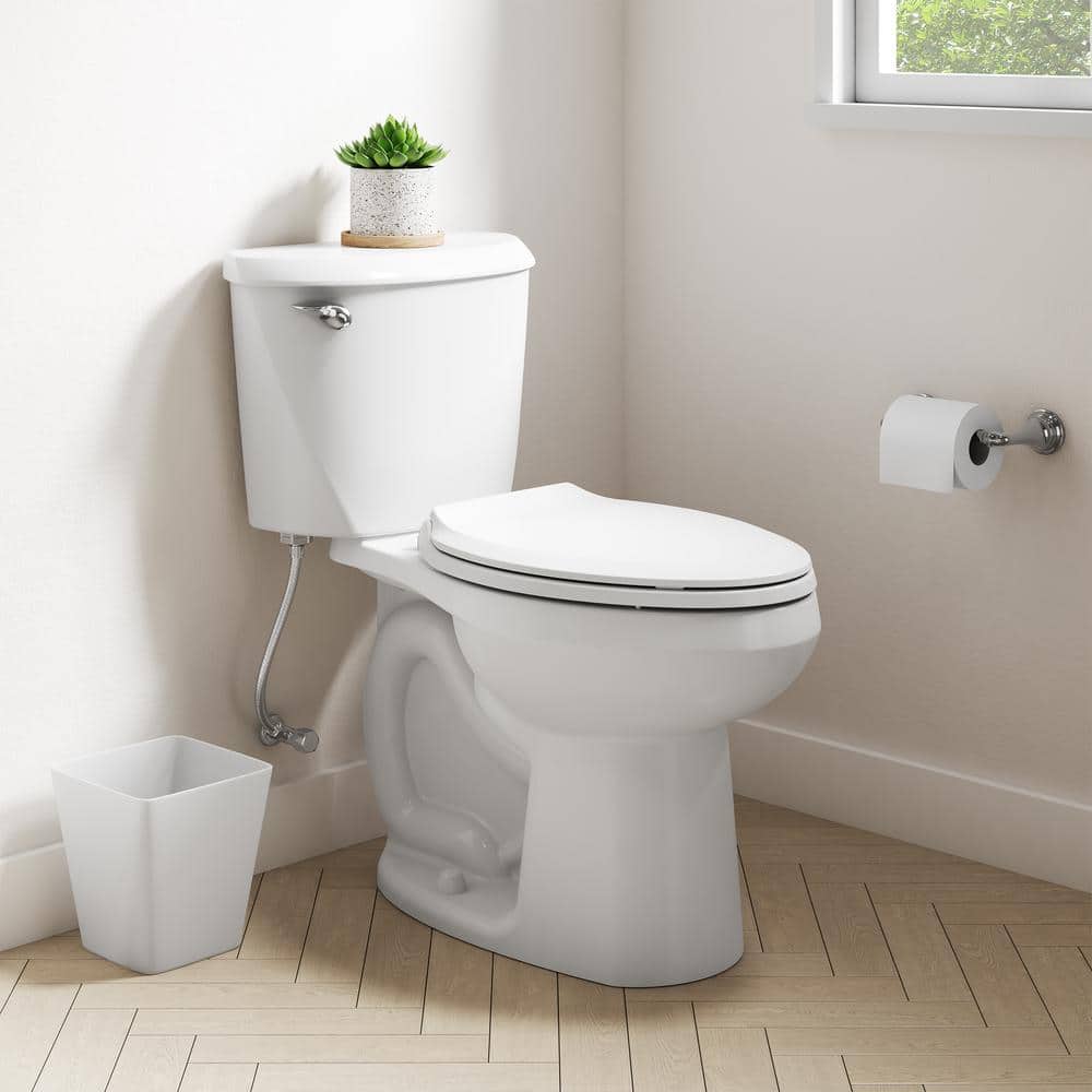 American Standard Reliant 12 in. Rough In 2-Piece 1.28 GPF Single Flush Elongated Toilet with Slow Close Seat in White
