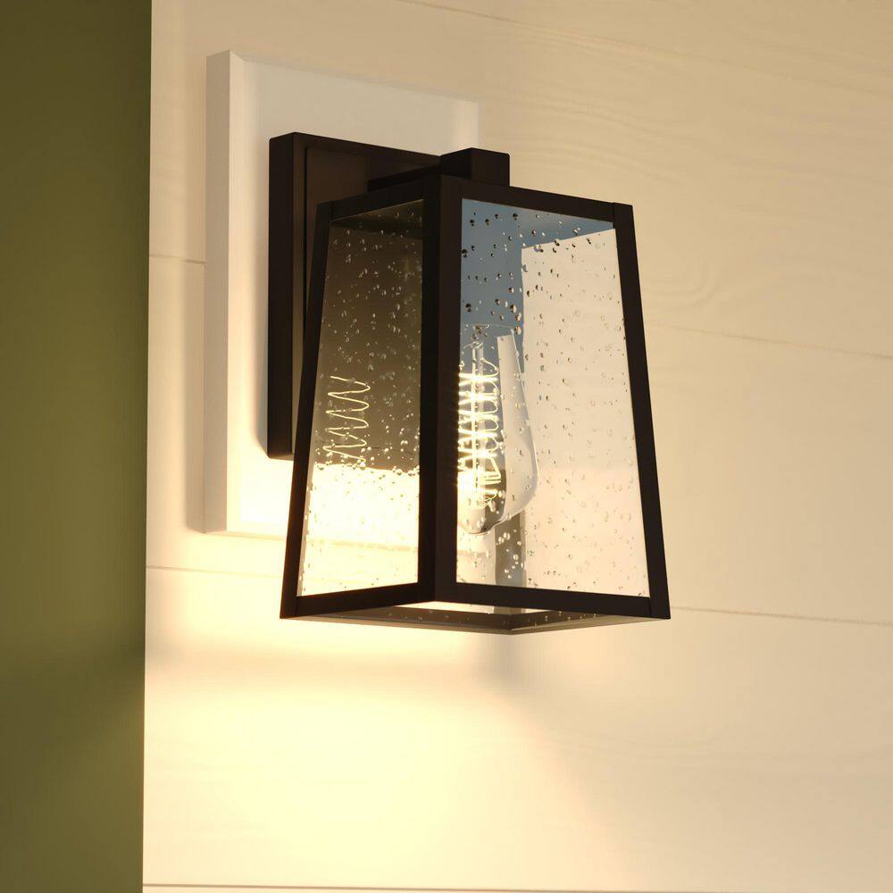 Sutton 9.5 in. H Black Outdoor Hardwired Sconce Wall Light made of Durable Steel, Clear Seeded Glass price history on PriceWatchPro
