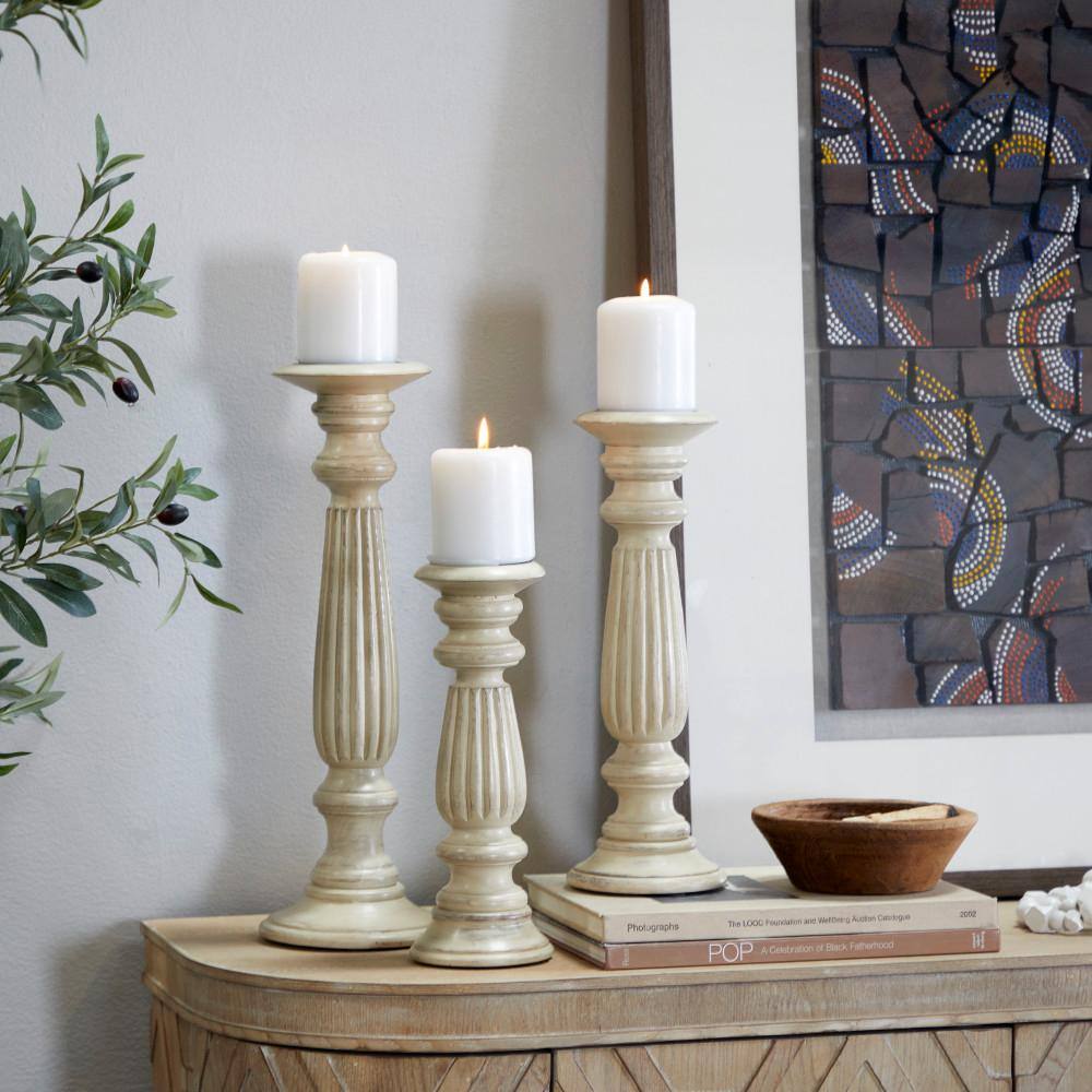 Elegant Mango Wood Teardrop Pillar Candlestick Trio, 18" Brown