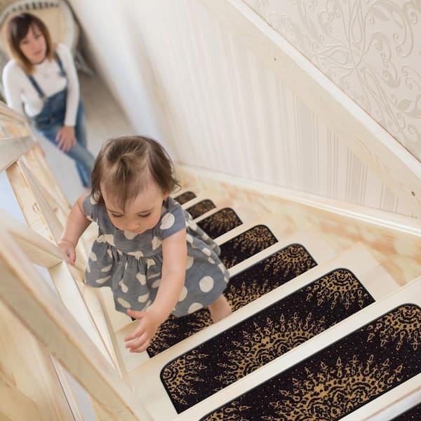 https://images.thdstatic.com/productImages/f4faeb9f-439b-4f7a-aa38-a8eff5510fa1/svn/black-beverly-rug-stair-tread-covers-hd-trd10345-8pk-e1_600.jpg