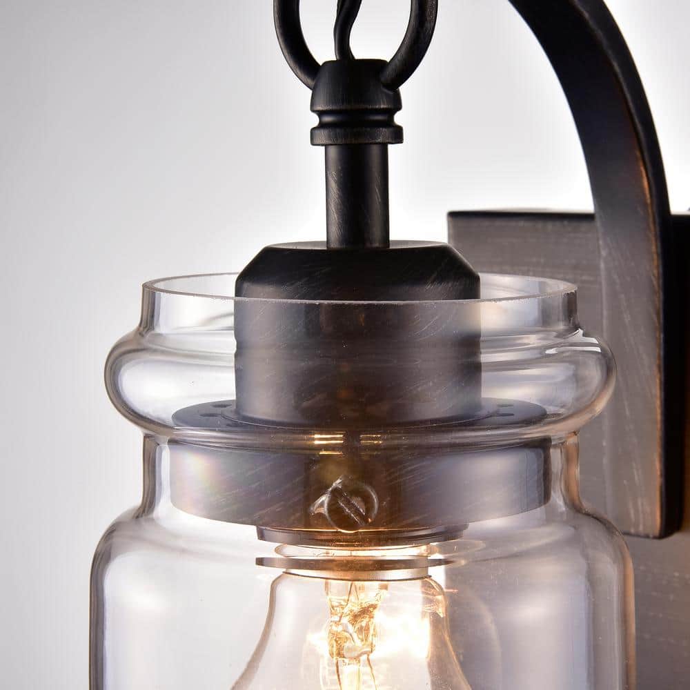 Antique Black Iron Wall Sconce with Clear Glass Shade